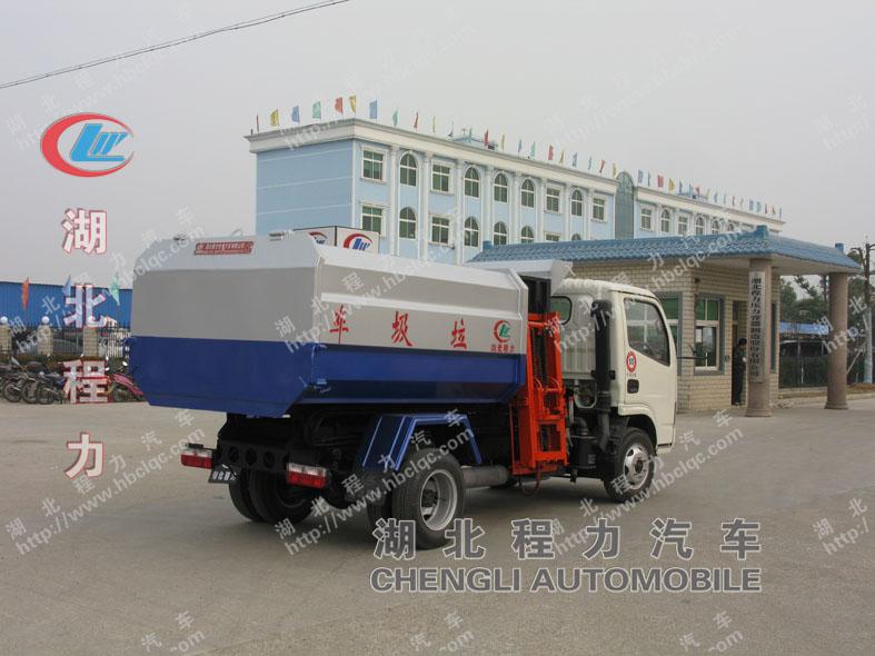 東風小霸王側(cè)翻壓縮式垃圾車圖片