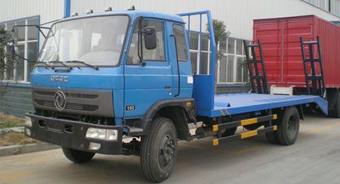 東風(fēng)153挖機(jī)運(yùn)輸車(chē)平板運(yùn)輸車(chē)廠圖片