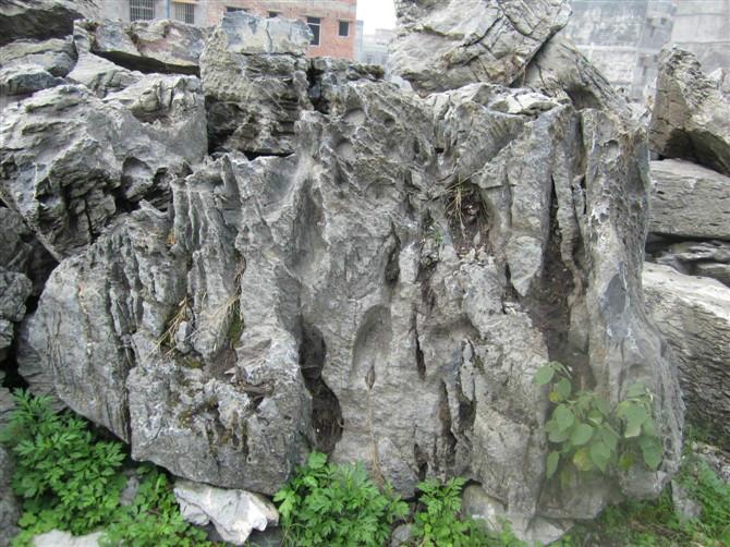 供應廣東英石、疊石、英石假山、英德廠家批發(fā)英石、大量批發(fā)英石