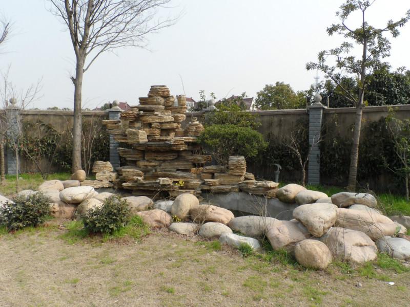 供應(yīng)上海川沙制作千層石假山廠家電話，上海川沙千層石假山制作圖片