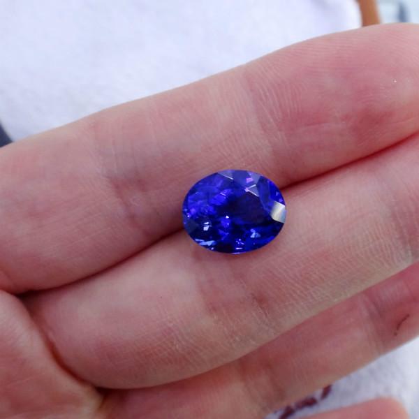 供應(yīng)5.05克拉天然橢圓形坦桑石裸石定制個性坦桑石戒指